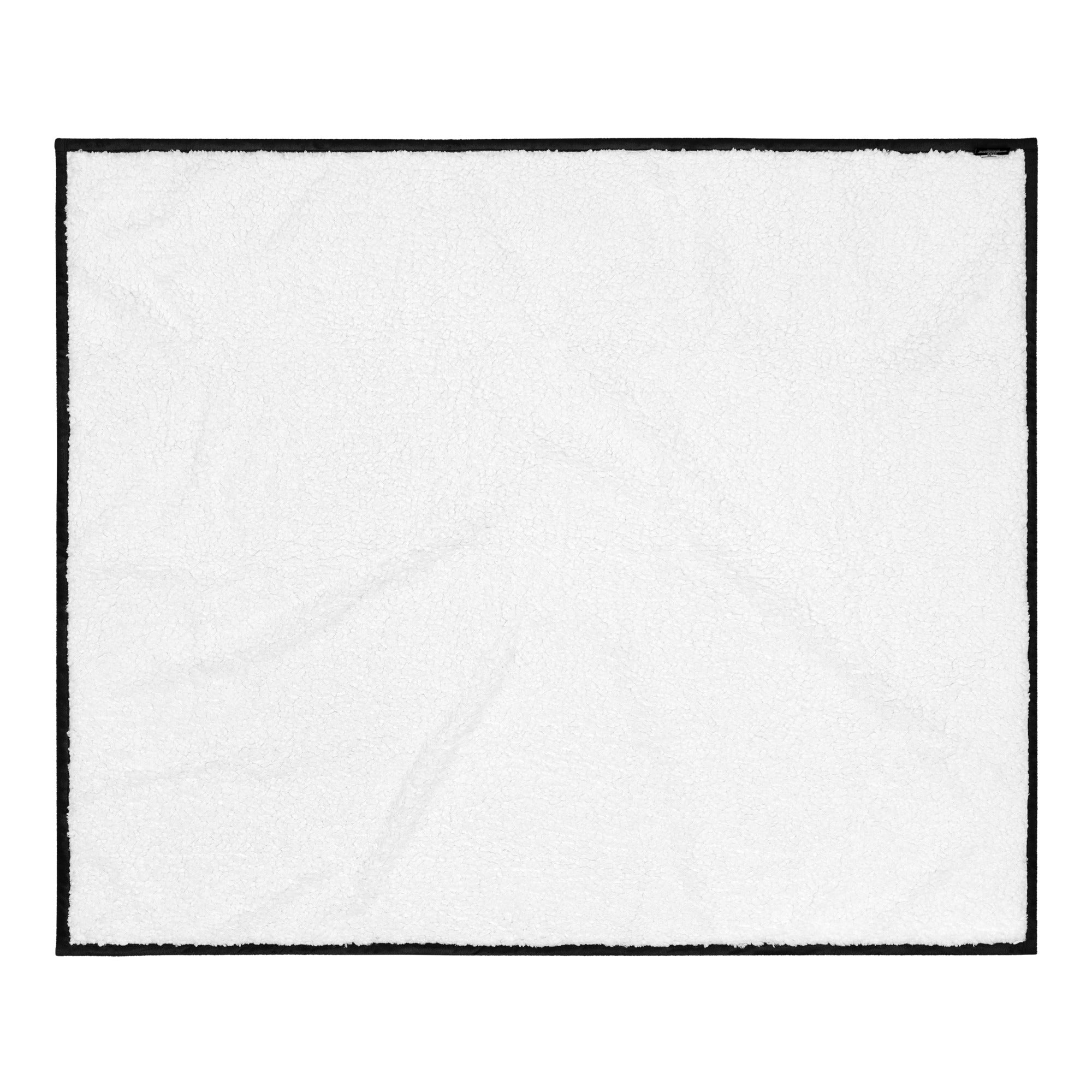 Stay warm with our Sherpa Blanket featuring soft fleece 