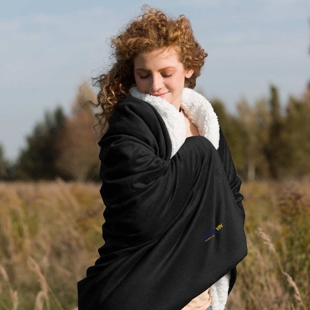 Stay warm with our Sherpa Blanket featuring soft fleece 