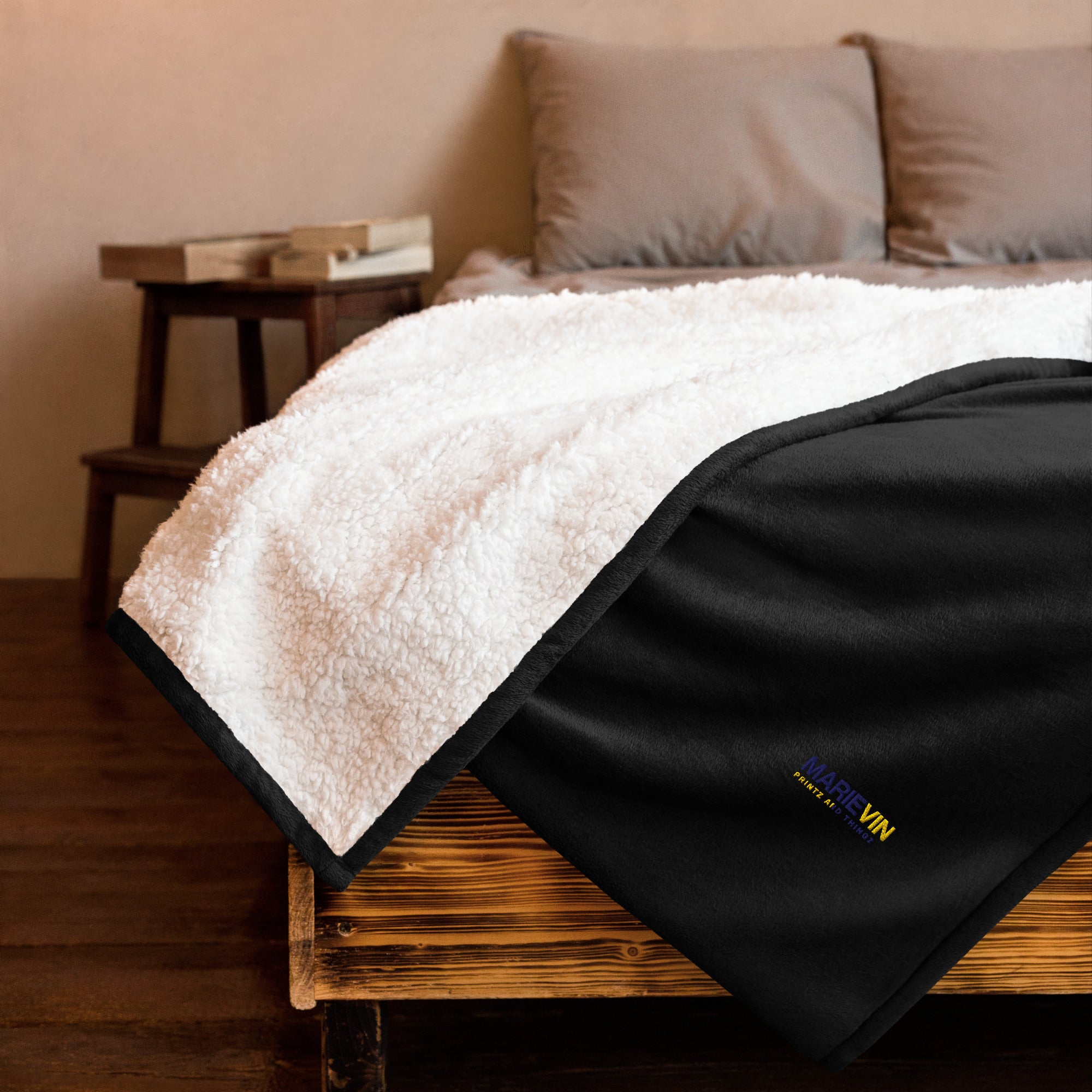 Stay warm with our Sherpa Blanket featuring soft fleece 
