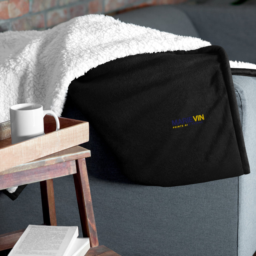 Stay warm with our Sherpa Blanket featuring soft fleece 