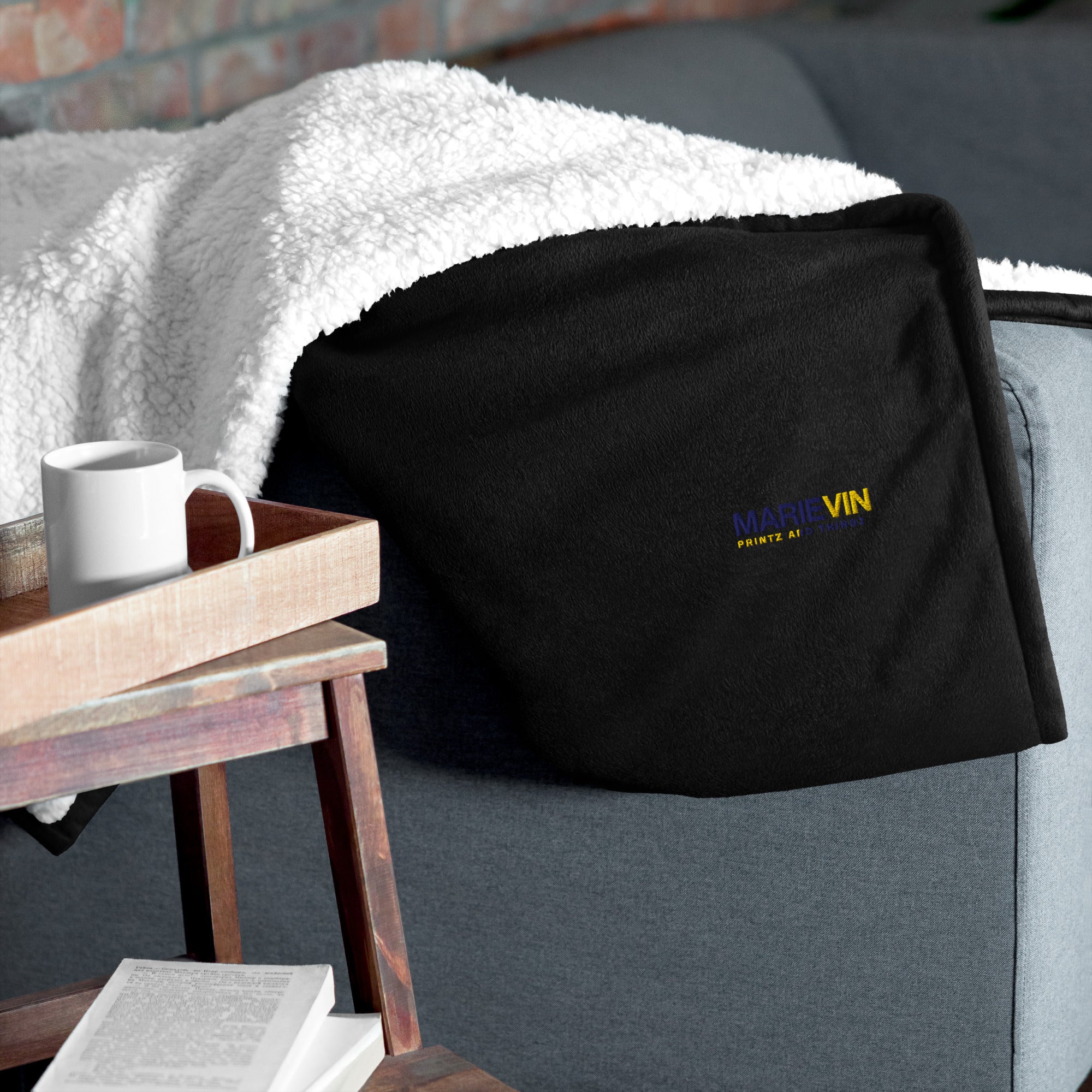 Stay warm with our Sherpa Blanket featuring soft fleece 