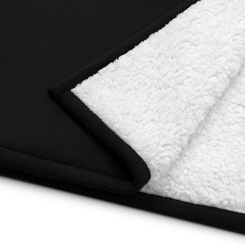 Stay warm with our Sherpa Blanket featuring soft fleece 