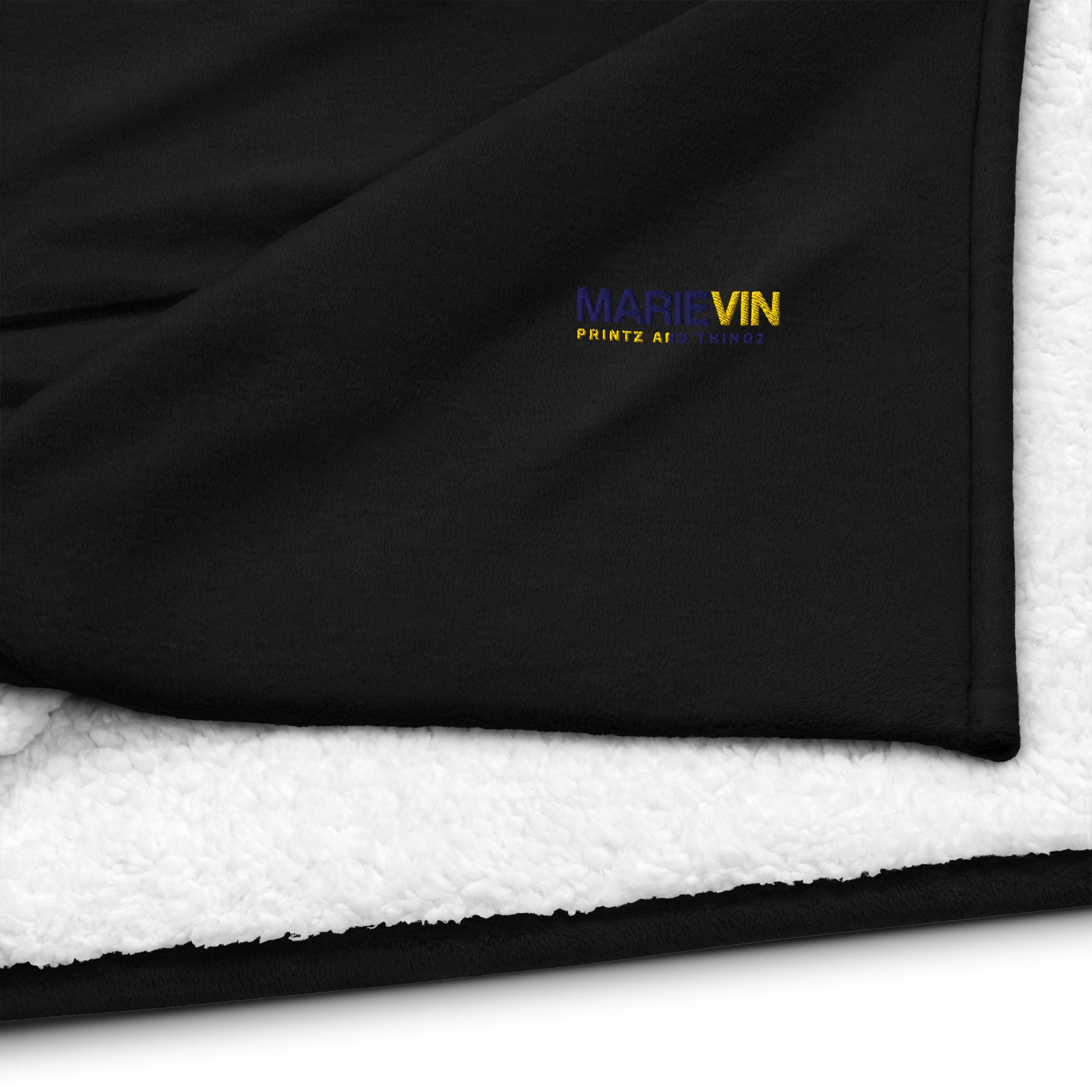 Stay warm with our Sherpa Blanket featuring soft fleece 
