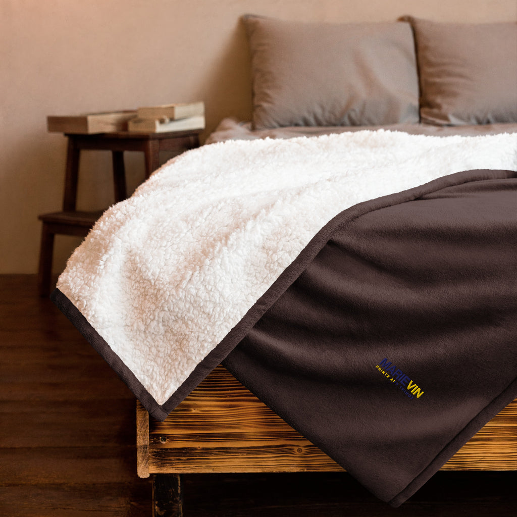 Stay warm with our Sherpa Blanket featuring soft fleece 