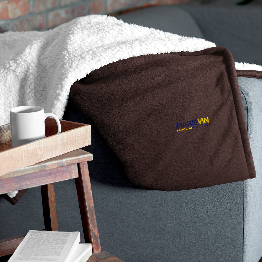 Stay warm with our Sherpa Blanket featuring soft fleece 