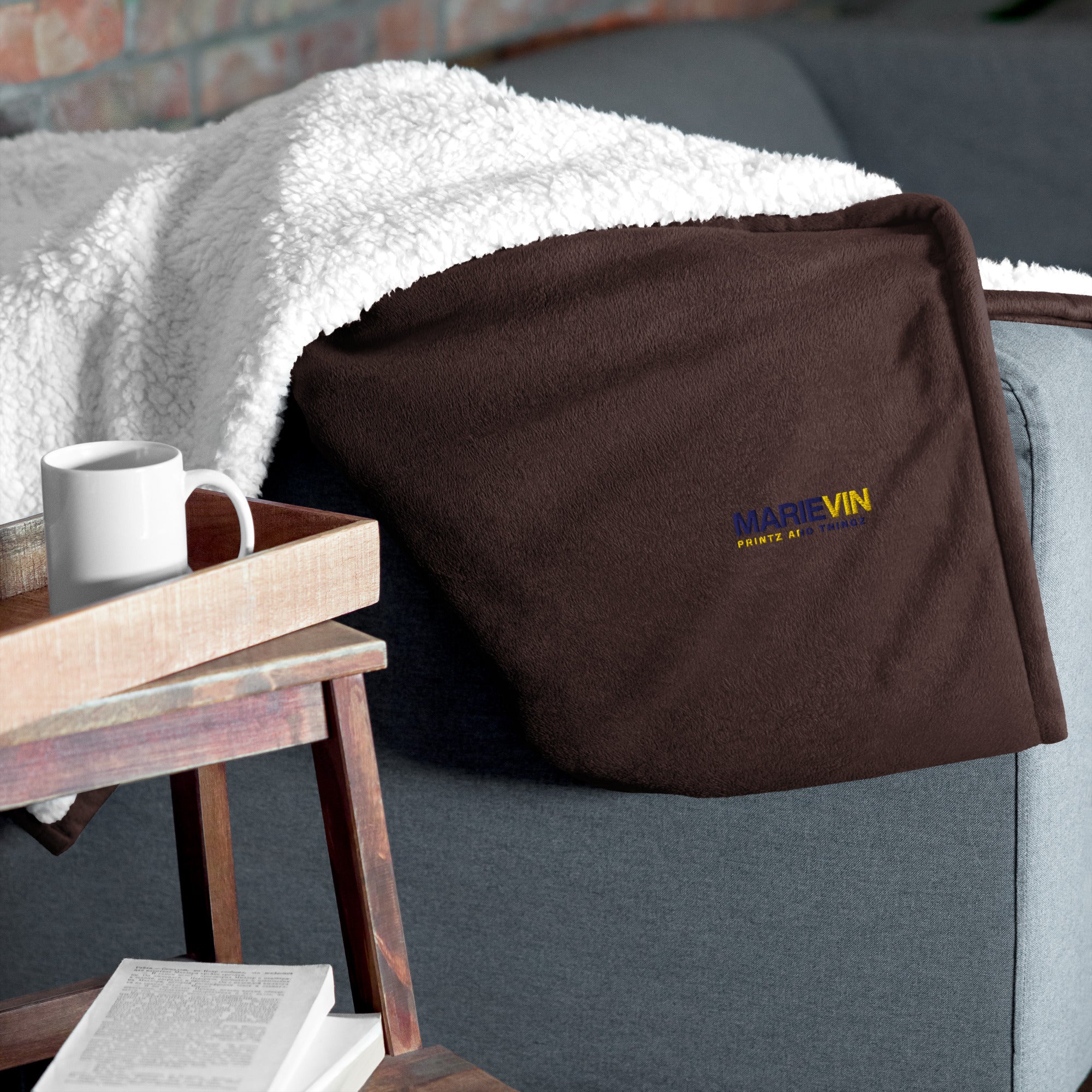 Stay warm with our Sherpa Blanket featuring soft fleece 