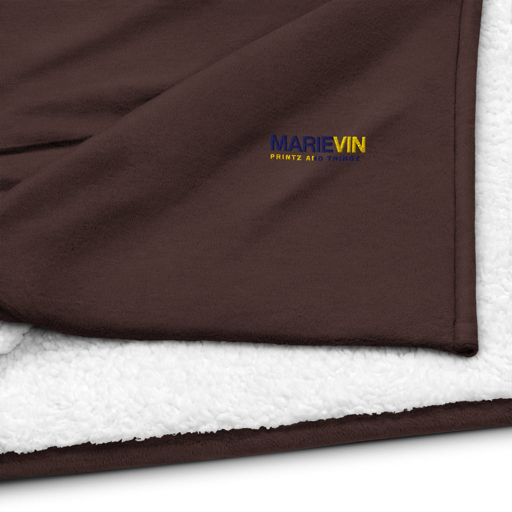 Stay warm with our Sherpa Blanket featuring soft fleece 