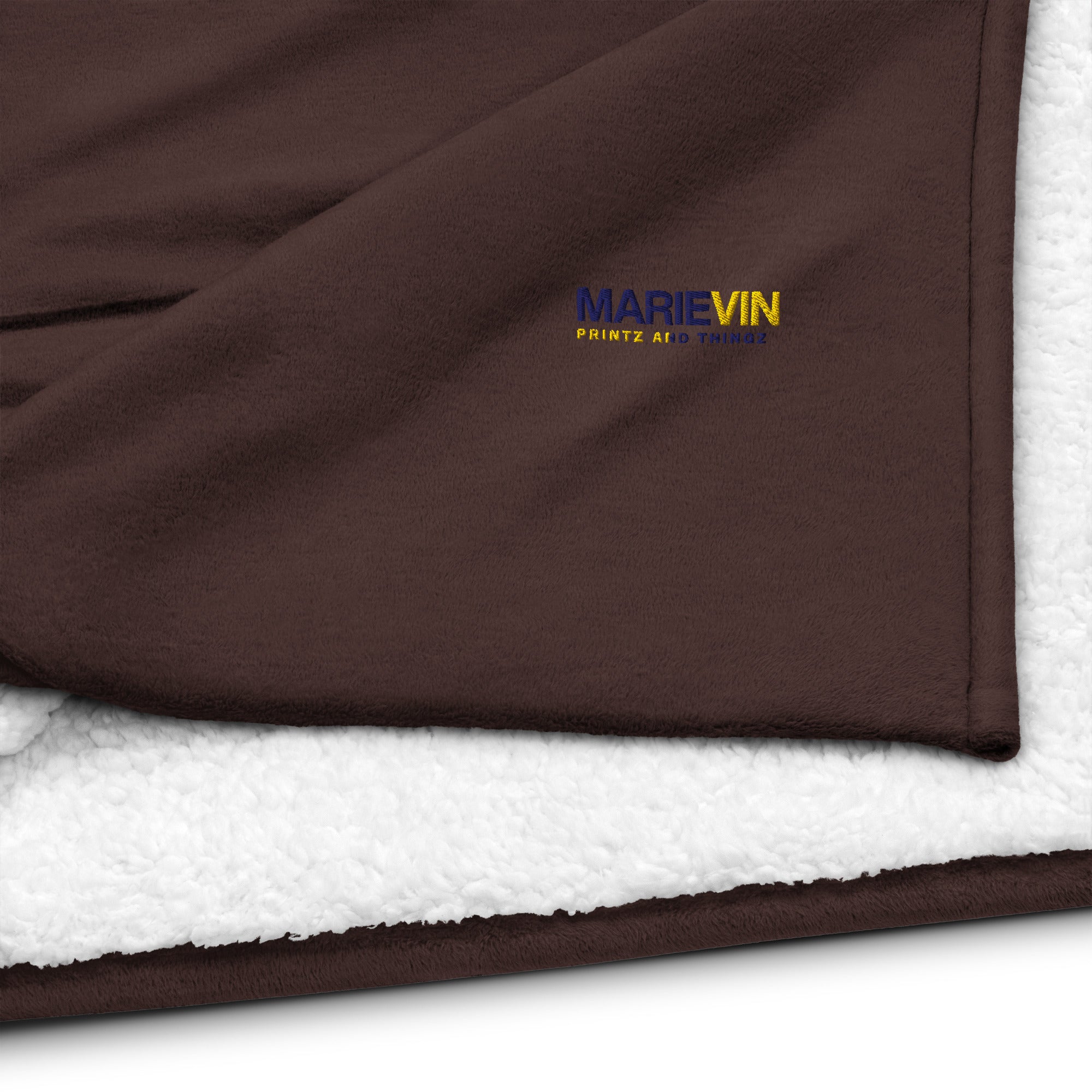 Stay warm with our Sherpa Blanket featuring soft fleece 
