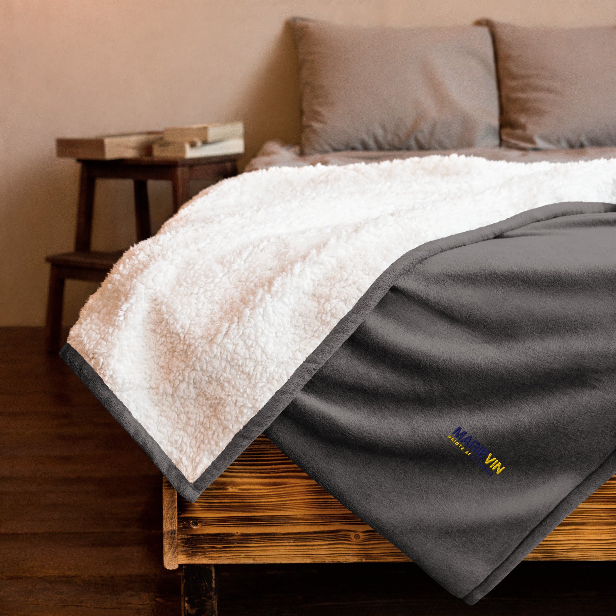 Stay warm with our Sherpa Blanket featuring soft fleece 