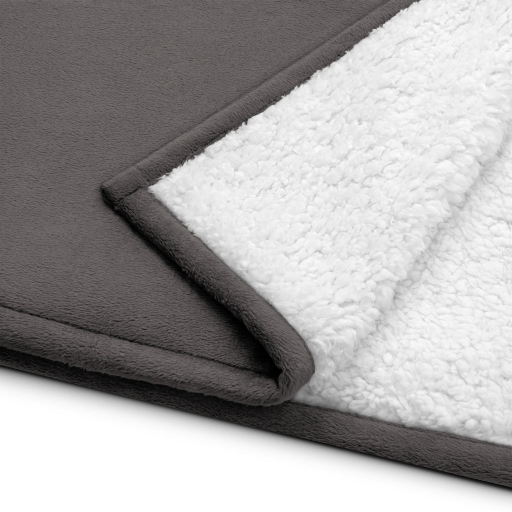 Stay warm with our Sherpa Blanket featuring soft fleece 