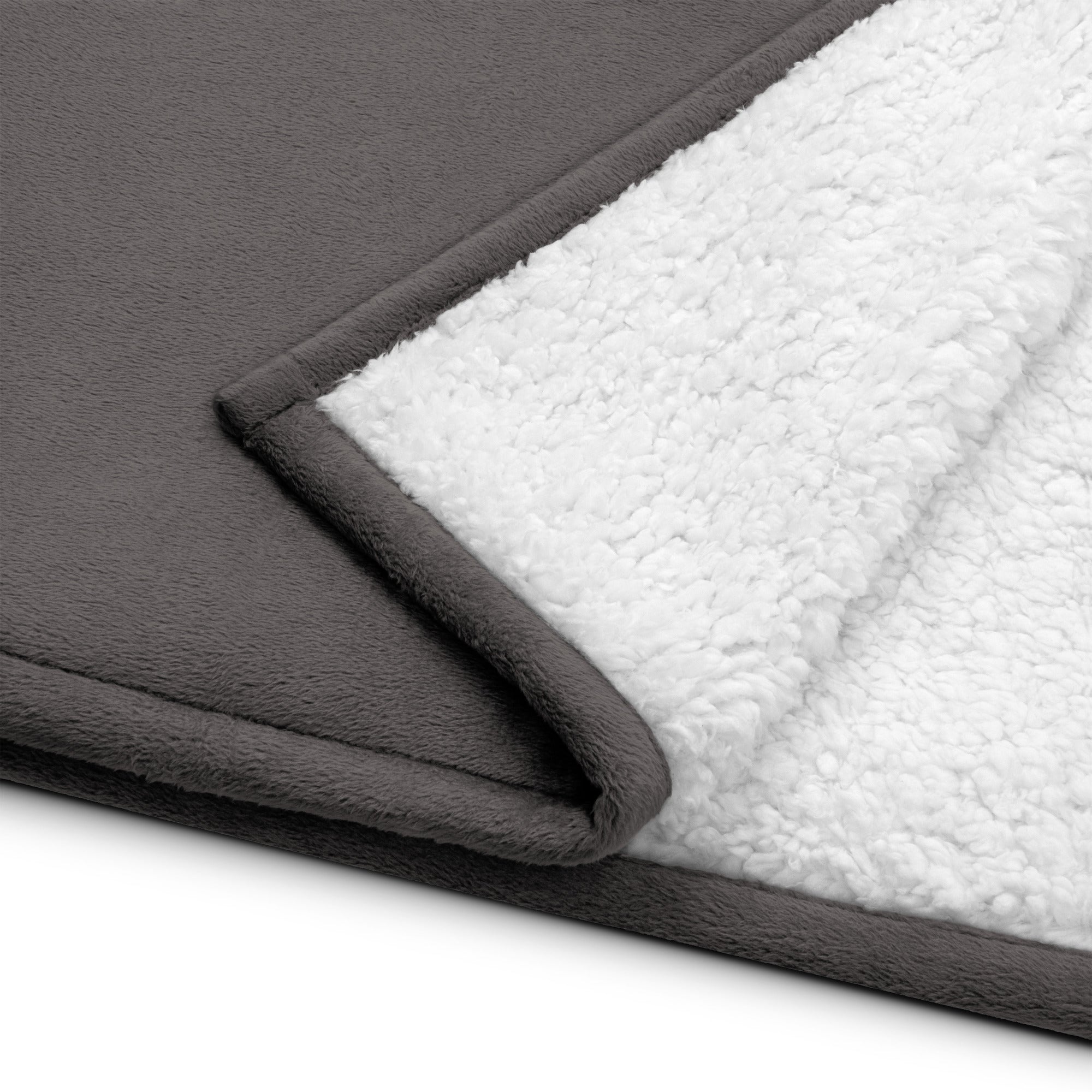 Stay warm with our Sherpa Blanket featuring soft fleece 