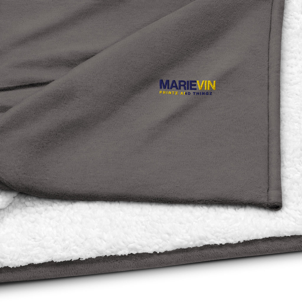 Stay warm with our Sherpa Blanket featuring soft fleece 