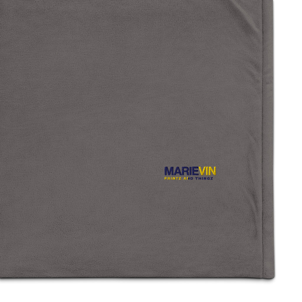 Stay warm with our Sherpa Blanket featuring soft fleece 